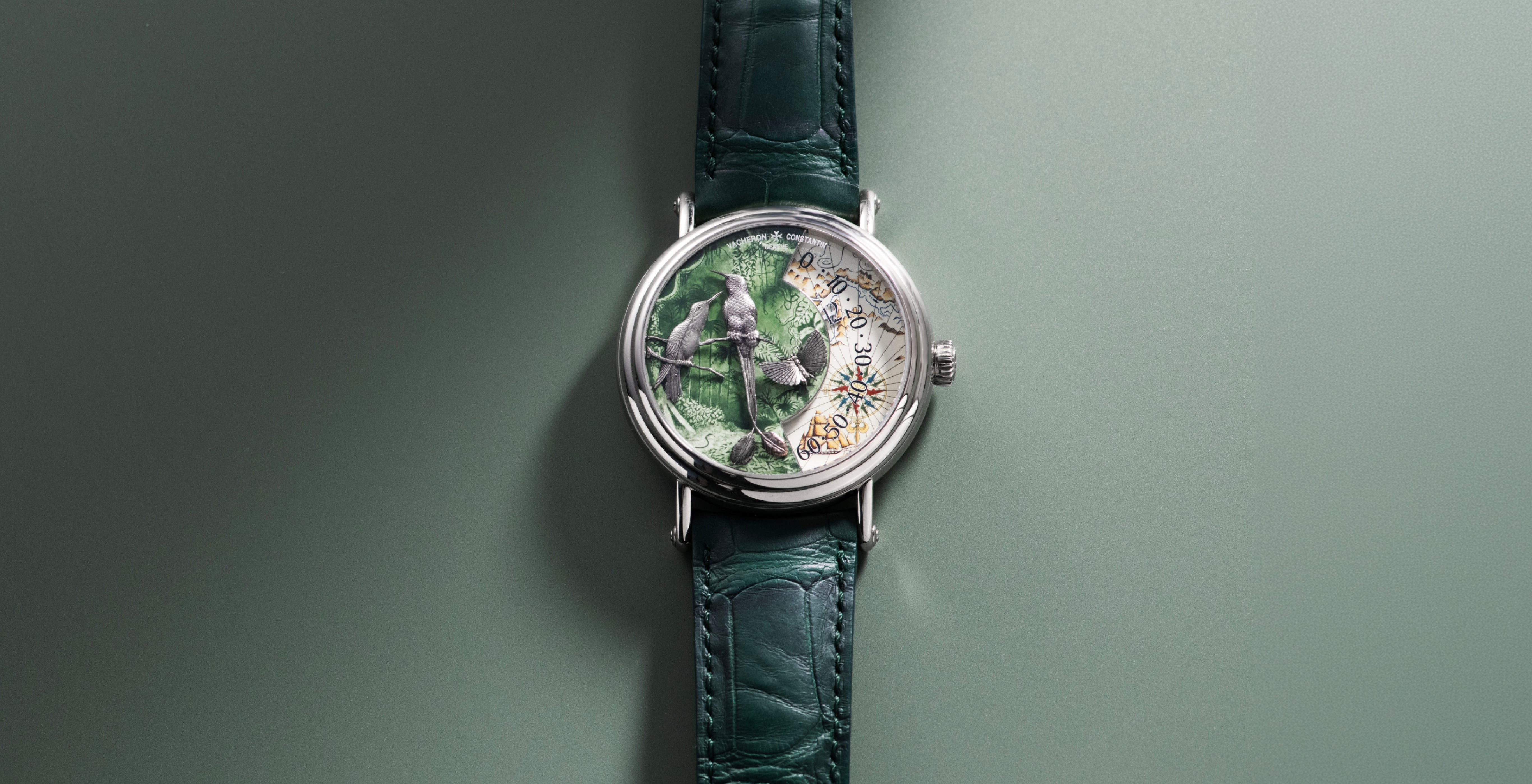 Vacheron Constantin Métiers d’Art Tribute to Explorer Naturalists Terre de Feu in white gold, featuring a hand-painted green enamel dial, wandering-hours display and green leather strap.