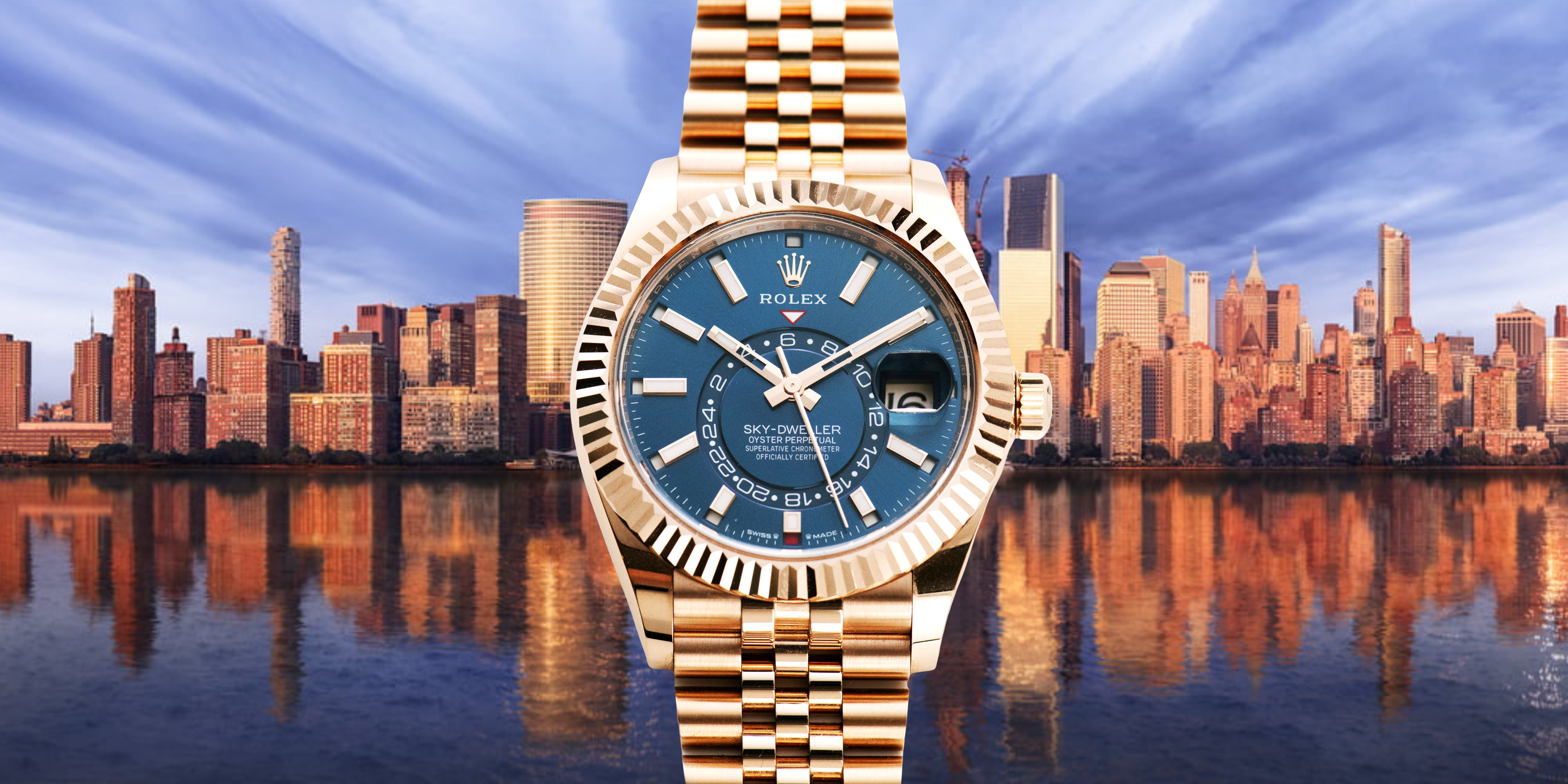 Rolex Sky-Dweller in Everose gold with blue dial against the New York City skyline.